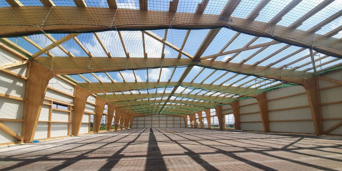 Aufstockung einer Halle in Geisenheim mit 1000 m² Personenauffangnetz