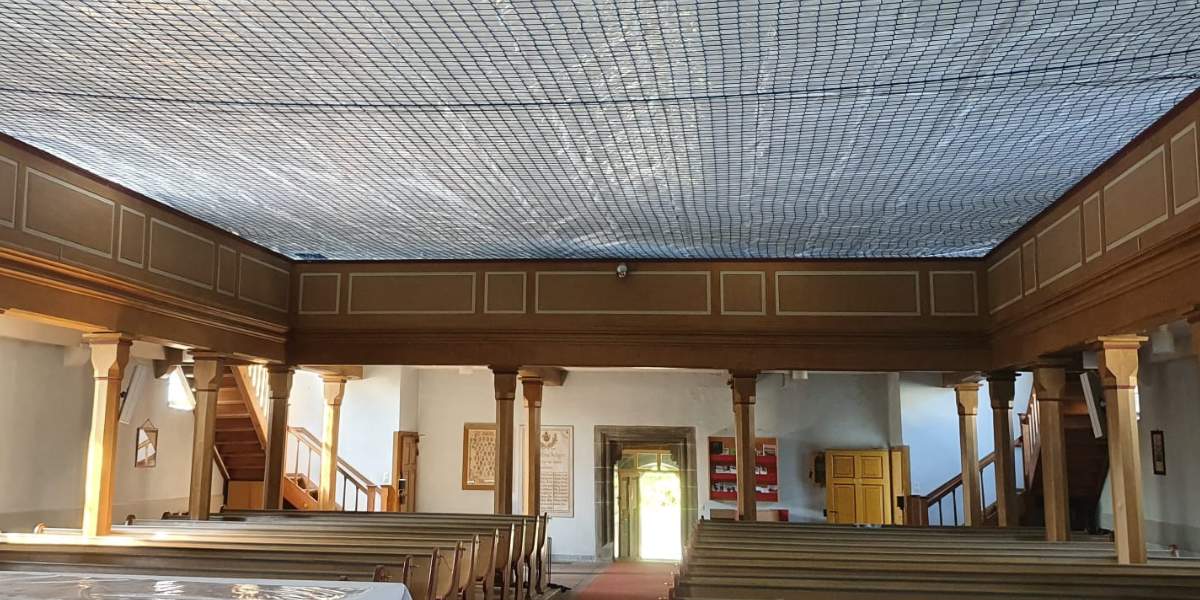 Personenauffangnetz zur Renovierung der Kirchendecke in Buseck